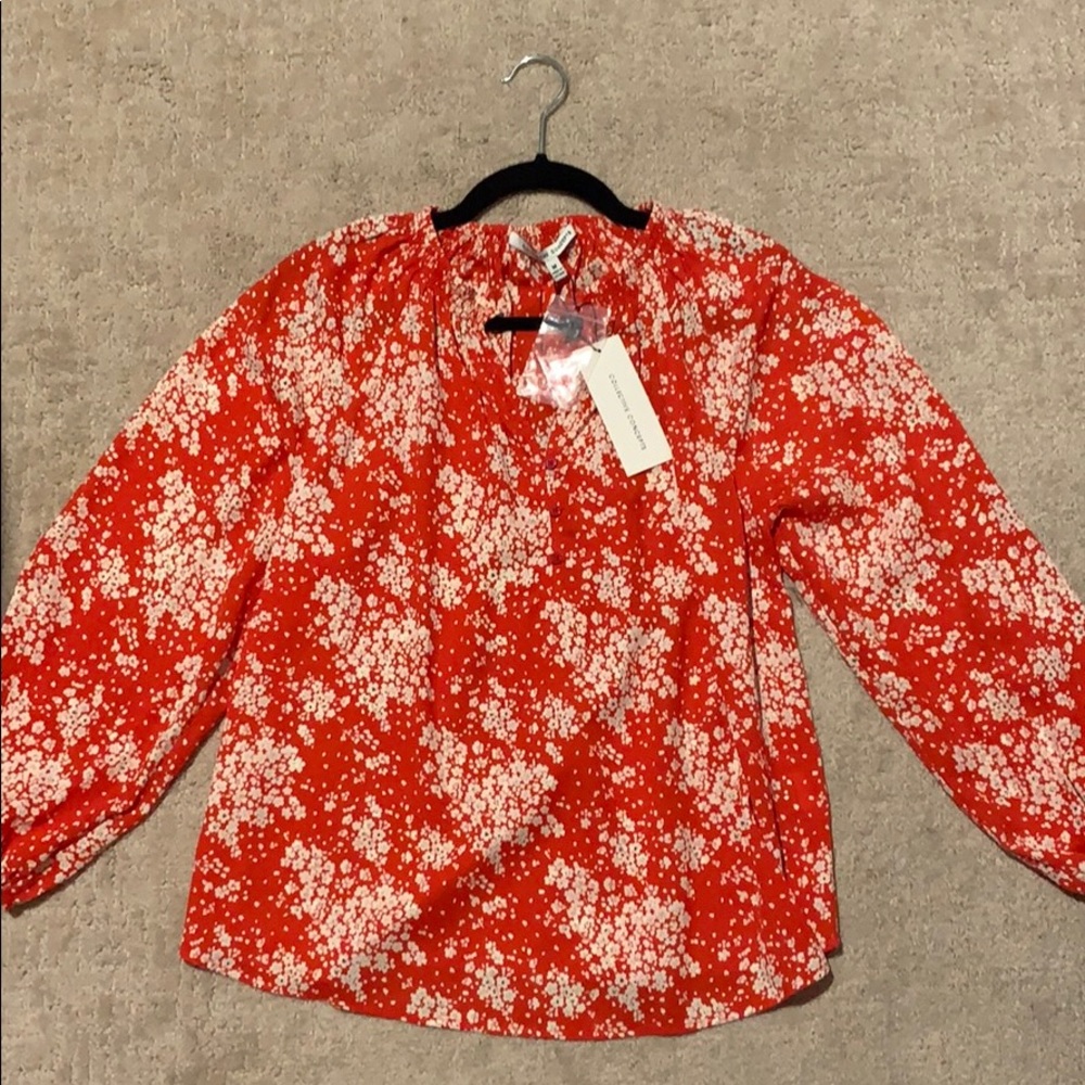 Red floral blouse